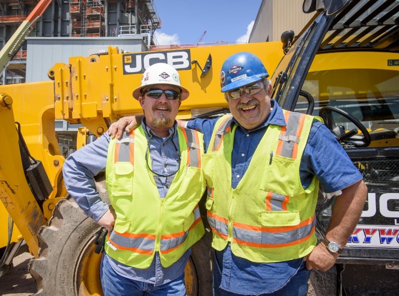 two men at a construction site